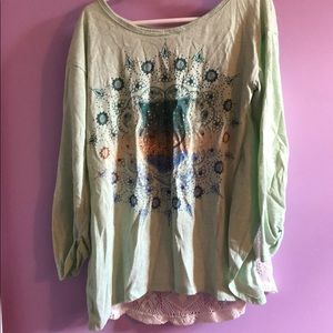 A mint green kids shirt